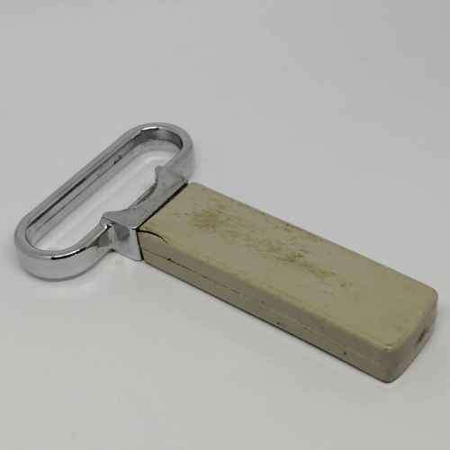 Vintage bottle opener and cork puller