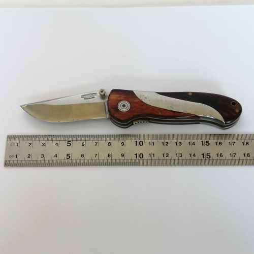 Gortex pocket knife with wood and stainless steel handle