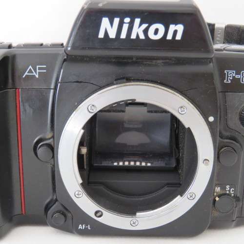 Nikon AF 601 camera body & strap - Battery cover missing & Corner broken on backplate