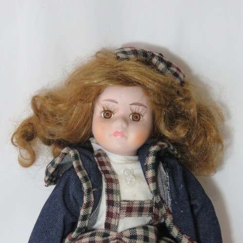 Porcelain doll with checked skirt and jean jacket - 40 cm High