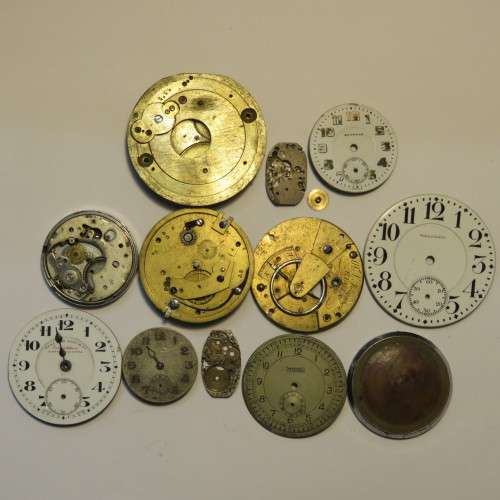 Lot of watch faces and broken movements