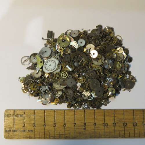 Bag with 100's of watch parts and gears