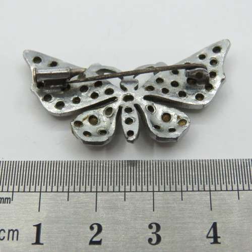 Vintage butterfly brooch with many stones