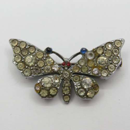 Vintage butterfly brooch with many stones