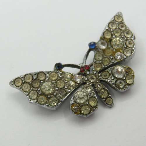 Vintage butterfly brooch with many stones
