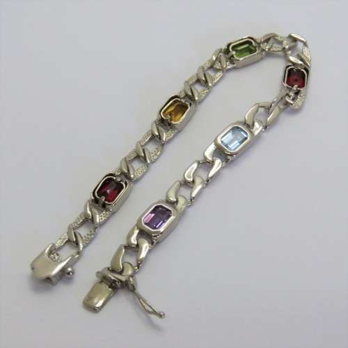 Costume unused silver look-alike bracelet with colored stones
