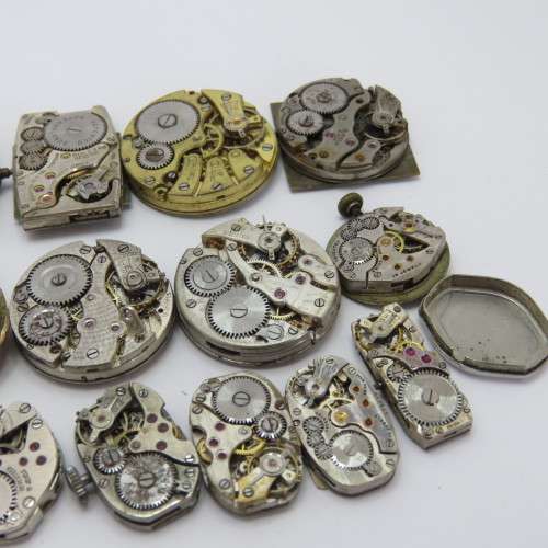 Lot of 14 mechanical watch movements for spares