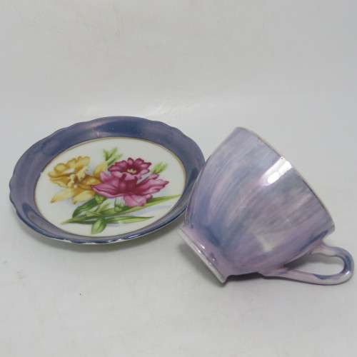 Vintage porcelain cup and saucer