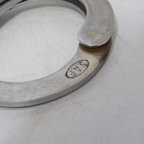 Two pairs of old SA Police handcuffs in pouch
