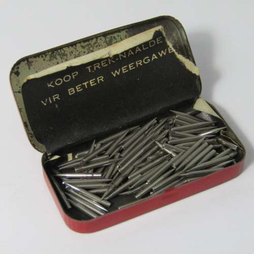 Almost full tin of gramophone needles in Trek tin