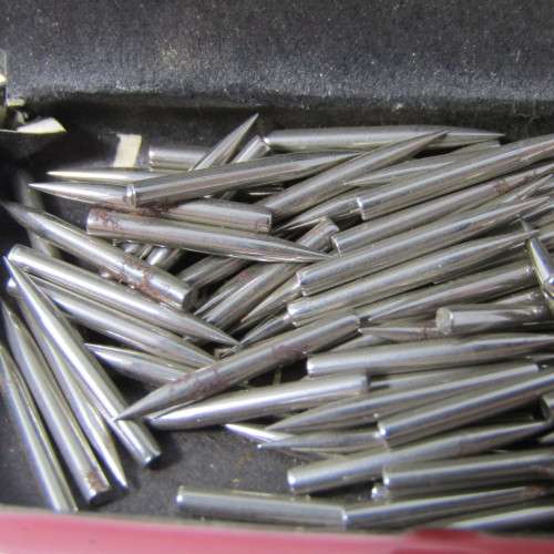 Almost full tin of gramophone needles in Trek tin