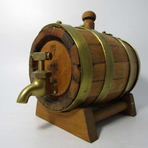 Small Wooden wine barrel with brass tap
