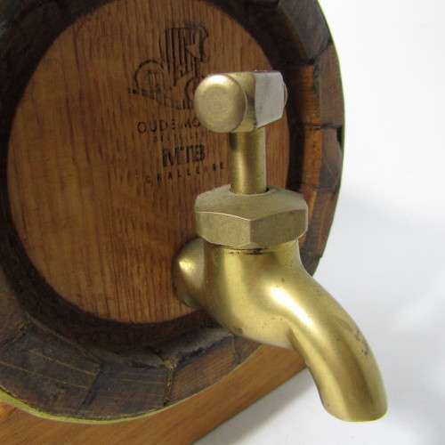 Small Wooden wine barrel with brass tap