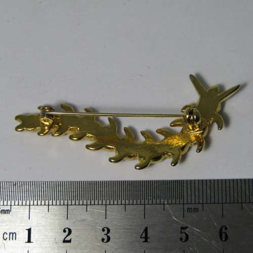 Vintage Gold coloured caterpillar brooch