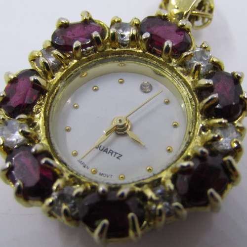 Beautiful Gold coloured Quartz pendant watch