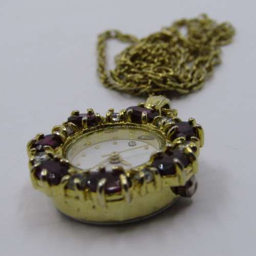 Beautiful Gold coloured Quartz pendant watch