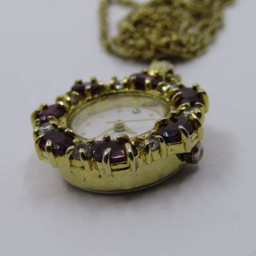 Beautiful Gold coloured Quartz pendant watch