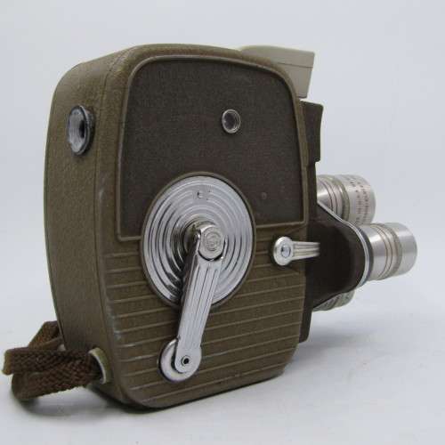 Vintage Keystone 8mm movie camera in damaged pouch - working