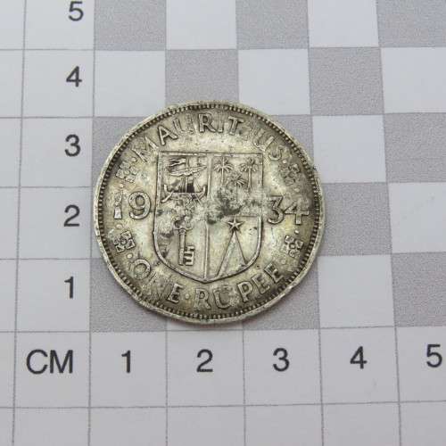 WW2 Handmade dogtag on a 1934 Mauritius One Rupee coin