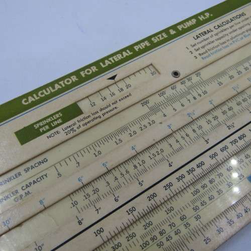 Lot of 4 vintage Sprinkler calculator cards