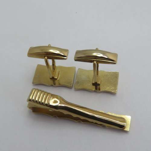 Vintage set of cufflinks with tie clip