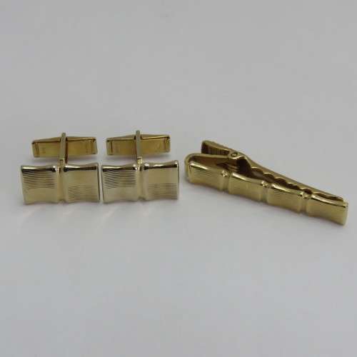 Vintage set of cufflinks with tie clip