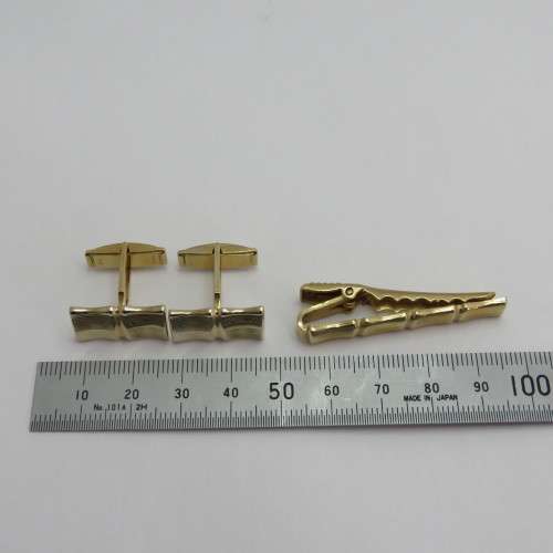 Vintage set of cufflinks with tie clip