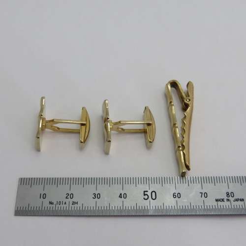 Vintage set of cufflinks with tie clip
