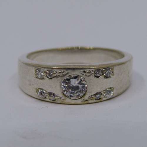 Sterling Silver ring with clear stones - weighs 8.8 grams - size Z/13