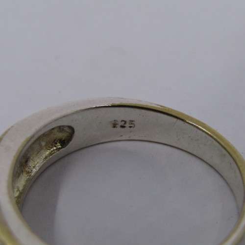 Sterling Silver ring with clear stones - weighs 8.8 grams - size Z/13