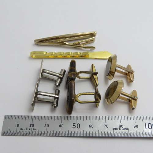 3 Pairs of vintage cufflinks and two tie clips