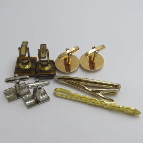 3 Pairs of vintage cufflinks and two tie clips