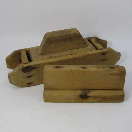 Antique wooden butter press