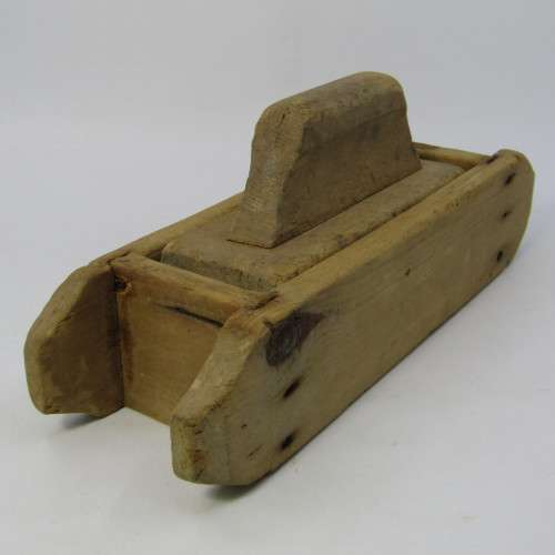 Antique wooden butter press