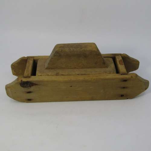 Antique wooden butter press