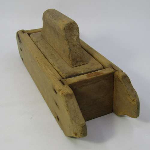 Antique wooden butter press