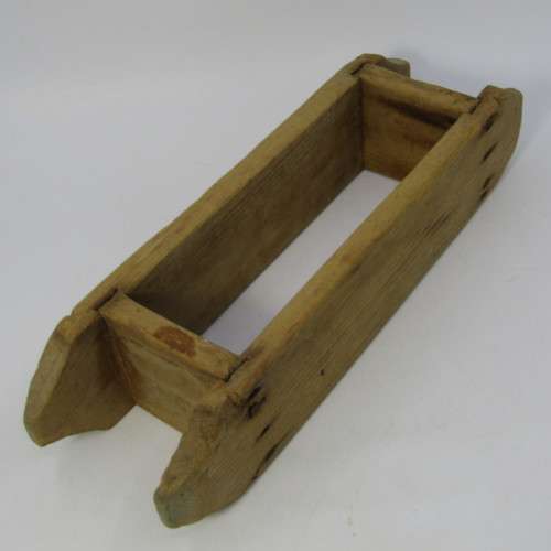 Antique wooden butter press