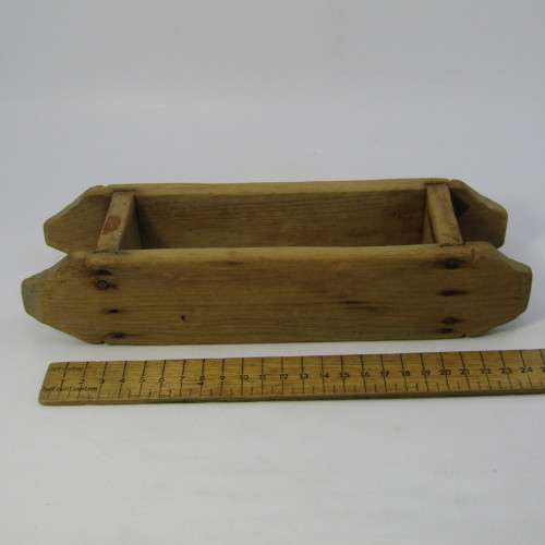 Antique wooden butter press