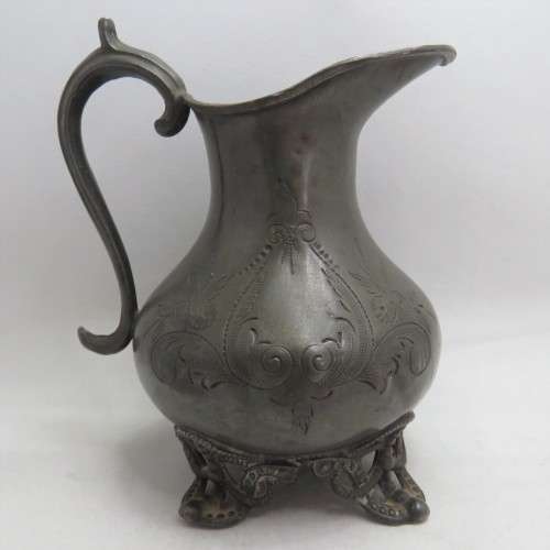 Antique small pewter jug