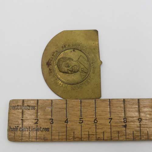 Small brass plate with Nelson Mandela unsure of origin