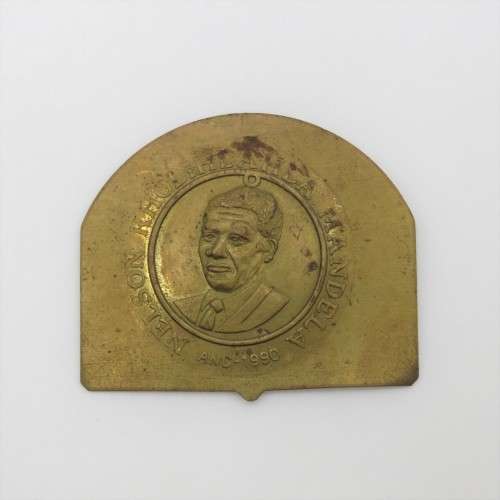 Small brass plate with Nelson Mandela unsure of origin