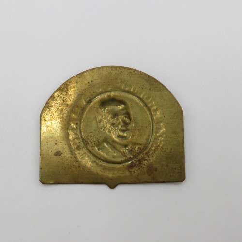 Small brass plate with Nelson Mandela unsure of origin