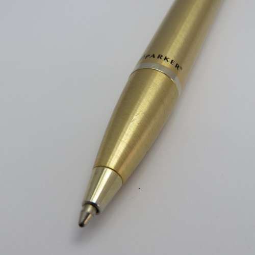 Gold coloured Parker ball point pen