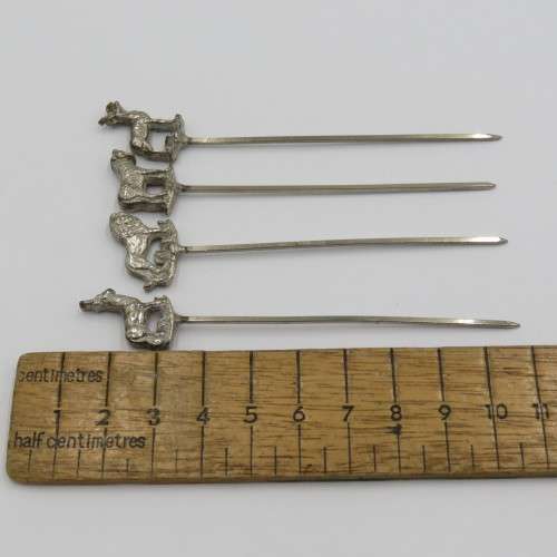 Set of 4 white metal cocktail sticks