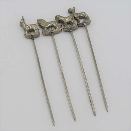 Set of 4 white metal cocktail sticks