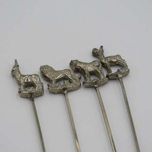 Set of 4 white metal cocktail sticks