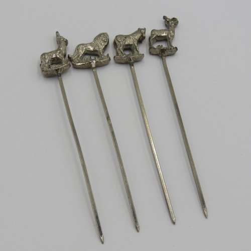 Set of 4 white metal cocktail sticks