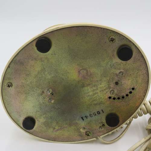 Vintage brass and plastic rotary dial telephone