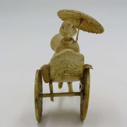 Vintage Japanese Celluloid Geisha girl rickshaw figurine