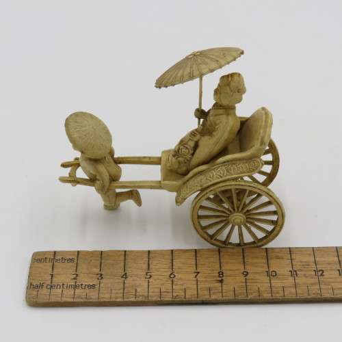 Vintage Japanese Celluloid Geisha girl rickshaw figurine